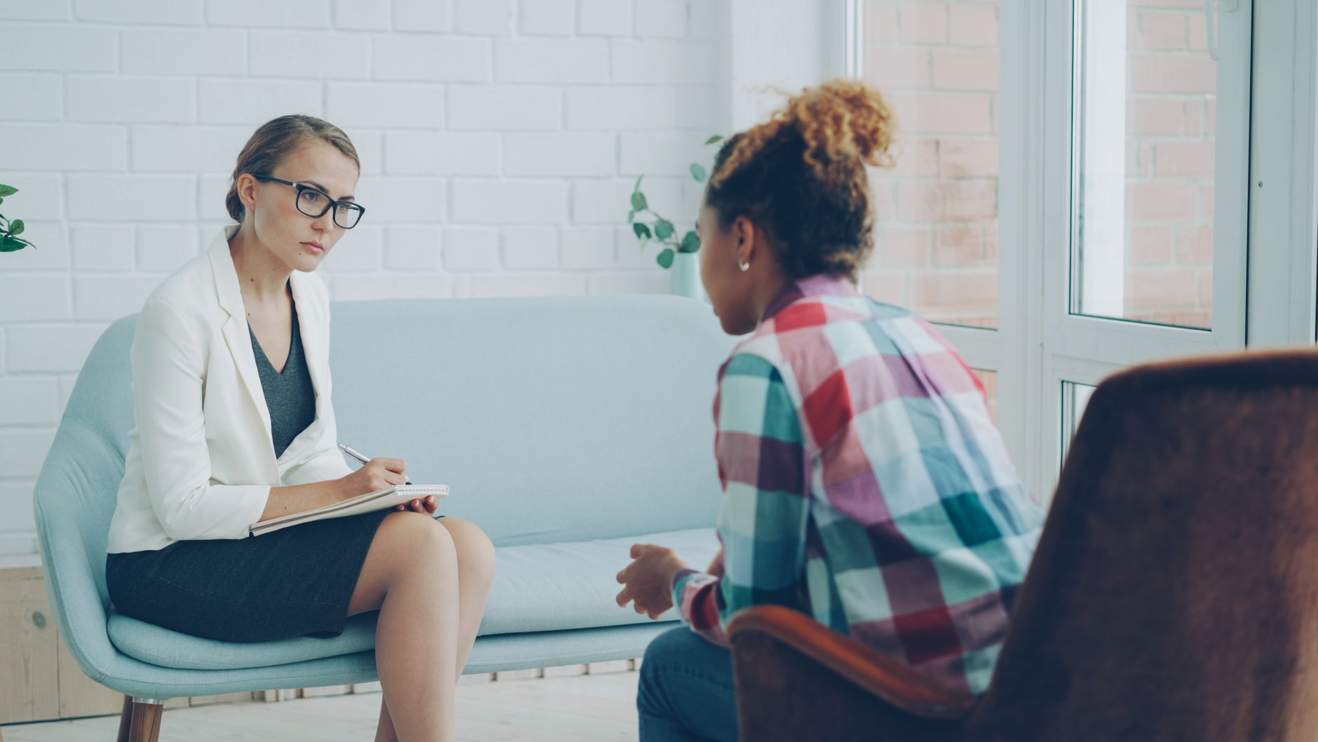 Counselor listening closely during a one-on-one session